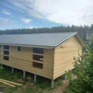 Фото готовых работ - Дом под усадку из проф. бруса естественной влажности 15х9,5 м + терраса 3х4 м.