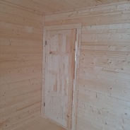 Фото готовых работ - Каркасно-щитовой дом 7.5 х 7.5 м + терраса 3.0 х 4.0 м