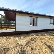 Фото готовых работ - Каркасный дом 11х8 м + терраса 2,5х8 м.